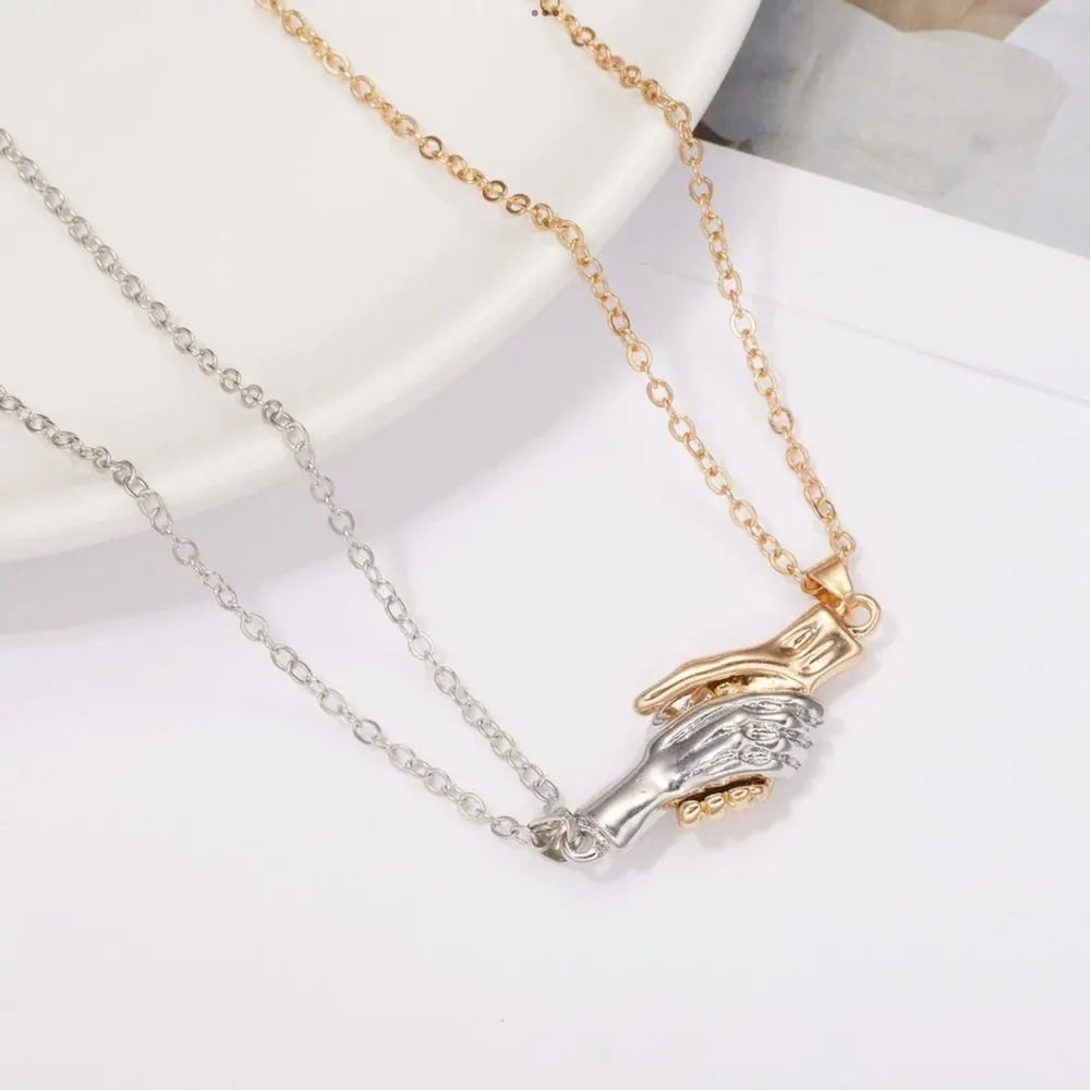 COLLAR PAREJA MANOS UNIDAS